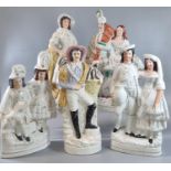 Collection of 19th Century Staffordshire flat back figurines and figure groups to include: