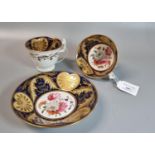 Trio of 19th century English porcelain comprising: coffee cup, teacup and saucer with hand painted