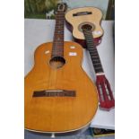 Musima German acoustic six string guitar together with a small size acoustic six string guitar. (