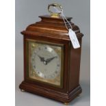 Elliott of London mahogany mantel clock with silvered face, marked 'Swansea Goldsmiths'. (B.P. 21% +