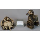 Two John Hughes Welsh pottery Groggs of a dog and a stylised sheep's head. Impressed marks to the