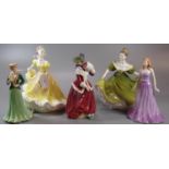 Four Royal Doulton bone china figurines to include: 'Christmas Morn', 'Amethyst', 'Ninette' and '
