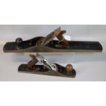 Stanley no. 8 plane, together with a Stanley no. 5 plane. (2) (B.P. 21% + VAT)