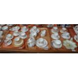 Three trays of late 19th/early 20th Century hand painted Limoges French porcelain in various designs