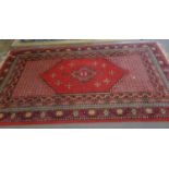 Chinese blue and beige floral and foliate wash ground rug together with a Middle Eastern design