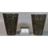 A pair of Indian engraved and enamel inlaid 'Lassi' cups with gilt Islamic calligraphy. Early to mid