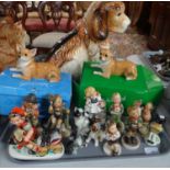 Tray of figures to include: Hummel figures of children, similar Friedel girl with dog and other