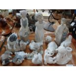 Tray of animal and human figures to include: Spanish porcelain Nao puppies, girl with basket,