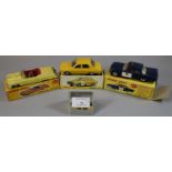 Dinky toys 264 R.C.M.P. patrol car, together with a Dinky toys 131 Cadillac Tourer and a Dinky