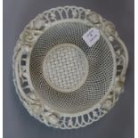 Probably Belleek, lattice and pierced design woven basket decorated with relief roses and foliage.