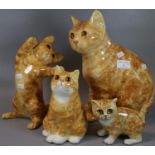 Collection of Winstanley pottery studies of ginger tabby cats and kittens, largest 32cm high approx.