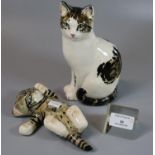 Studio Art pottery study of a seated cat with hand painted features by Masie Seneshall, dated