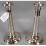 Pair of late 20th Century silver candlesticks on circular bases with loaded bases. Birmingham