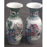 Pair of probably Macau Chinese porcelain floor vases decorated with storks, bamboo, flowers and
