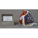 Royal Crown Derby English bone china paperweight in the form of a robin with silver stopper. (B.P.