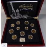 The Coins of Britannia's last Century gold and platinum covered coins edition in original case, by