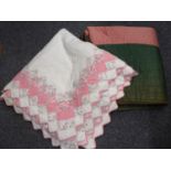 Box containing two vintage cotton quilts; one Welsh quilt with pink concentric circle design