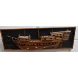Wooden half block ship's hull model with brass label 'John ? & Co', overall length of back panel