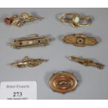 Collection of 9ct gold and other unmarked brooches: Victorian Mourning brooch, opal set brooch,