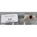 18ct gold diamond and red stone cluster ring. Size N. 3.8g approx. (B.P. 21% + VAT)