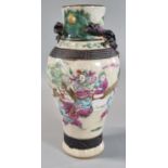 Chinese export porcelain Famille Rose crackle glazed baluster shaped 'Warrior Vase', decorated