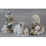 Three Lladro Spanish porcelain figures: two of people, one of Polar Bears, two with children and