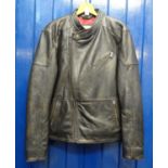 Joe Brown's leather motorbike jacket with red padded lining, size Large. With original labels. (B.P.
