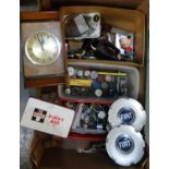 Box containing assorted items to include: Fiat hub caps, Fiat badge, collection of diecast enamel