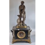 Early 20th century black slate gilt metal mounted figural mantel clock, the clock surmounted by a