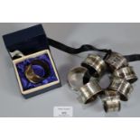 Collection of eight similar silver napkin rings, to include: one produced for the Silver Jubilee