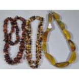Three hardstone necklaces to include tiger's eye and others. (B.P. 21% + VAT)