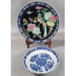 Japanese porcelain polychrome charger with Chinese style rose enamel on a black ground, decorated