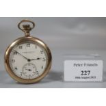 Yellow metal open faced keyless pocket watch with Arabic face having seconds dial, marked 'A