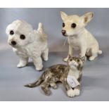 Group of three Mike Hinton ceramic animals to include: reclining cat with glass eyes (AF), Chihuahua