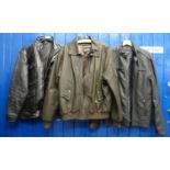 Three men's leather and pleather bomber jackets with pockets, one by Woodland leather, all three