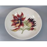 Moorcroft tube lined Art Pottery floral design centre bowl, 'Dahlia' pattern, cream ground with