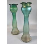 Pair of irridescent glass tall bulb vases with textured bodies. 34cm high approx. (2) (B.P. 21% +