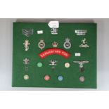 Collection of Military badges and insignia, to include: Royal Military Police, Third Reich Eagle,