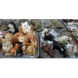 Two trays of mostly ceramic cat figures, to include: Nao Pottery kittens, Hummel, Sylvac, Kowa