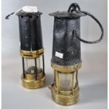 Two vintage brass Miner's lamps in patinated used condition, one marked 'Davis, Birkby'. (2) (B.P.