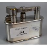 Dunhill nickle plated table lighter, marked 'Made in England', Patent No. 390107 Registered Design