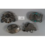 Four good quality USA belt buckles including: Bergamot 1981 Indian buckle, Buffalo buckle, Eagle