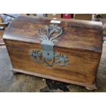 Metal mounted dome topped oak casket with hinged cover and bun feet. (B.P. 21% + VAT)