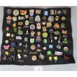 Collection of assorted pin badges including: Cardiganshire, Richard's Buses, Yr Urdd, Eddy Stobart