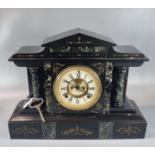 Early 20th century black slate and marble two train architectural; mantle clock with ceramic Roman