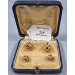 Pair of knot design 14ct gold cuff links with matching studs, cased. Marked '585'. 5g approx. (B.