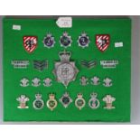 Collection of Police and Prison Service helmet plates and cap badges, to include South Wales