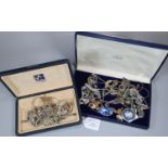 Two cases of assorted costume jewellery: chain necklaces, pendants etc. (B.P. 21% + VAT)