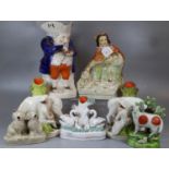 Collection of Staffordshire Pottery items, to include: pair of spill vases with cattle being milked,
