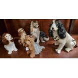 Group of assorted ceramic dogs to include: Beswick 2377 Terrier, Sylvac Spaniel, another Spaniel,